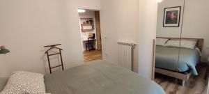 a bedroom with a bed and a ladder in a room at Casa Vacanze isopep in Lama Di Peligni