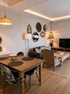 a living room with a table and a couch at The Sign Highlight Hotel in Bodrum City