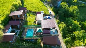 an overhead view of a house with a swimming pool at Bosnian Pyramid Glamping in Visoko