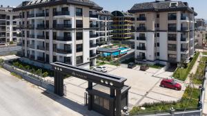 an aerial view of a parking lot with buildings at Eliz Paradise By Panjur in Alanya