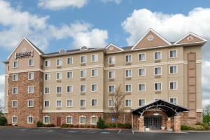 a rendering of the front of a hotel at Staybridge Suites Augusta by IHG in Augusta