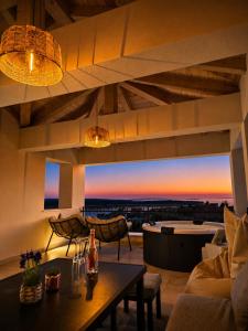 a living room with a view of a city at Villa Lumia in Banjol +30 photos