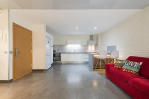 Kuchyň nebo kuchyňský kout v ubytování Suites Garden Loft Velázquez