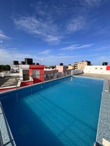 a large swimming pool on top of a building at Homes by Najma in Mtwapa