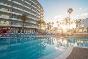 a swimming pool in front of a hotel at Bull Escorial & Spa in Playa del Ingles