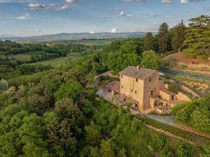 an aerial view of an old building on a hill at Villa Montebella Countryside Retreat in Montepulciano in Montepulciano