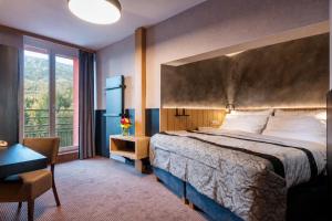Posteľ alebo postele v izbe v ubytovaní Atrium Hotel - Family friendly