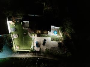 an aerial view of a yard at night at Cabana la Flo in Sohodol