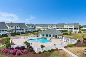 an aerial view of an apartment complex with a swimming pool at Pebble Beach I-211 in Emerald Isle