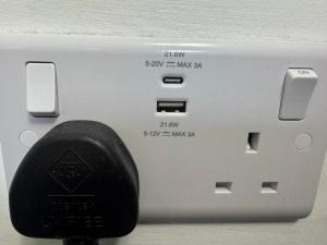 a close up of a electronic device with a black button at Blue Room in Ifield