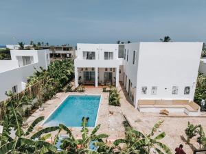 an aerial view of a house with a swimming pool at Verdana House in Kiwengwa