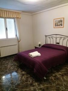 Postel nebo postele na pokoji v ubytování Casa Rural Amelia