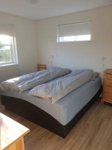 Llit o llits en una habitació de Jelling hus