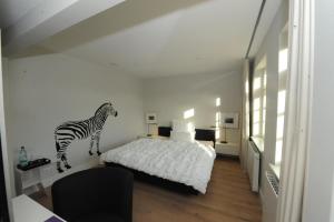 Postel nebo postele na pokoji v ubytování Designhotel Rosenbohm