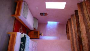 a view of a staircase in a house with a ceiling at Kasbah d'hotes ayad in Moulay Brahim