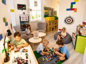 a group of children playing with lego in a room at Hévíz Springs - Kehidakustány in Kehidakustány
