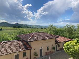 an image of a building in a vineyard at La Corte Nascosta Volpedo in Volpedo +98 photos