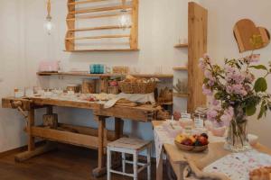 a kitchen with a table with fruit on it at Bucherhof in Marlengo