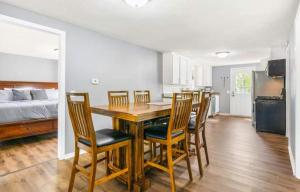 a kitchen and dining room with a table and chairs at Eternal Sunrises in Sunrise Beach