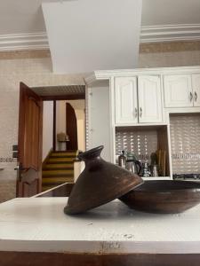 a metal object on top of a kitchen counter at Syrah Home in Tangier