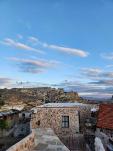 a view of the city from the roof of a building at MMF cave house in Nevşehir
