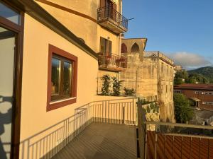 a balcony of a building with a view at Residenza 33 in Torchiara