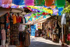 a market with a variety of clothes and souvenirs at Joint Boutique Hotel in Puerto Vallarta