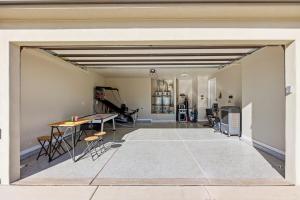 an open garage with a table and chairs and a gym at Royal Rock Adventures in Washington