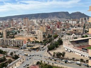 a view of a city with cars on a street at Tulipe appartement in Oran