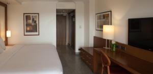 Voodi või voodid majutusasutuse Eko Hotel Main Building toas