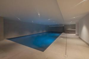 a swimming pool in a room with a ceiling at Apartment Leo - 2BR, Modern, Lift access, Mountain views in Les Houches
