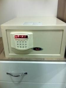 a clock sitting on top of a white microwave at Gorur Suite in Istanbul