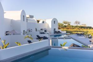 a rendering of a villa with a swimming pool at Maiandros Suites in Karterados