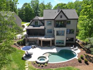 an aerial view of a house with a swimming pool at Paradise Cove in Denver