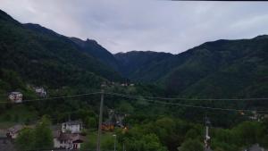 a view of a valley in the mountains at Albergo Coira Antica Dimora in Santa Brigida