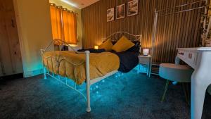 a bedroom with a bed in a room at Hot Tub Home - Stay in Stoke on Trent