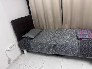 Llit o llits en una habitació de 2 Bed Studio