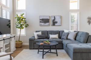 a living room with a couch and a table at Gilbert Douglas in Gilbert
