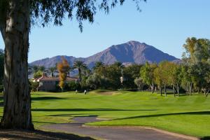 a view of a golf course with mountains in the background at Gilbert Douglas in Gilbert