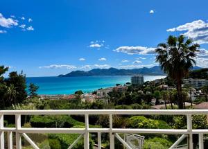 a view of the ocean from a balcony at Splendid view Apartment in Cannes in Cannes