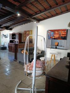 a living room with a chair and a couch at Casona Veroka in San Pedro