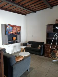 a living room with a couch and a table at Casona Veroka in San Pedro