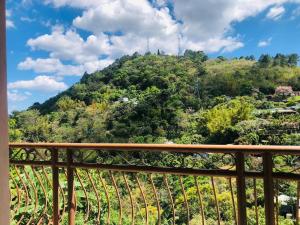 a view from a balcony of a mountain at Terra Vista Hotel in El Guayabo