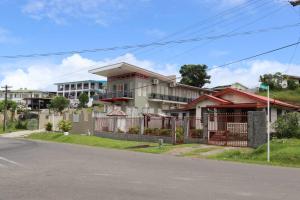 a house on the side of a street at 77 Fulaga Flats in Suva