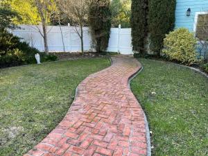 a brick path in the grass in a yard at Luxury Private Poolside Suite in Napa