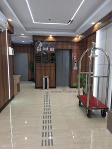 a hallway of a building with a treadmill at Hotel Lujain Al Dhahabi Star in Al ‘Awālī