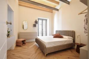 a bedroom with a bed and a window at B&B Ago e Luce - YourPlace Abruzzo in Vasto