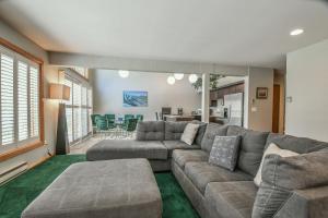 a living room with a couch and a table at Keystone Bristlecone Home 31 by SummitCove Lodging in Colorado in Keystone