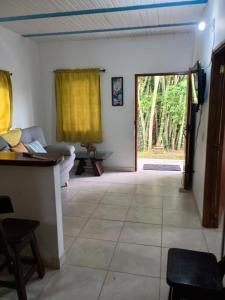 a living room with a couch and a window at PUEBlA in Marinilla