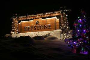 a christmas tree and a sign that says kynes at Frey Gulch 46 by SummitCove Lodging in Colorado in Keystone